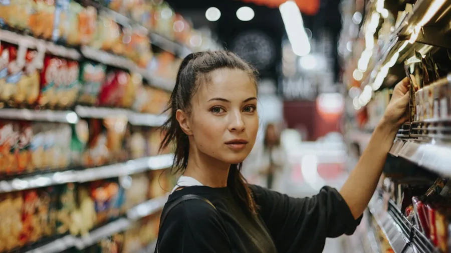consumer checking prices store shelf