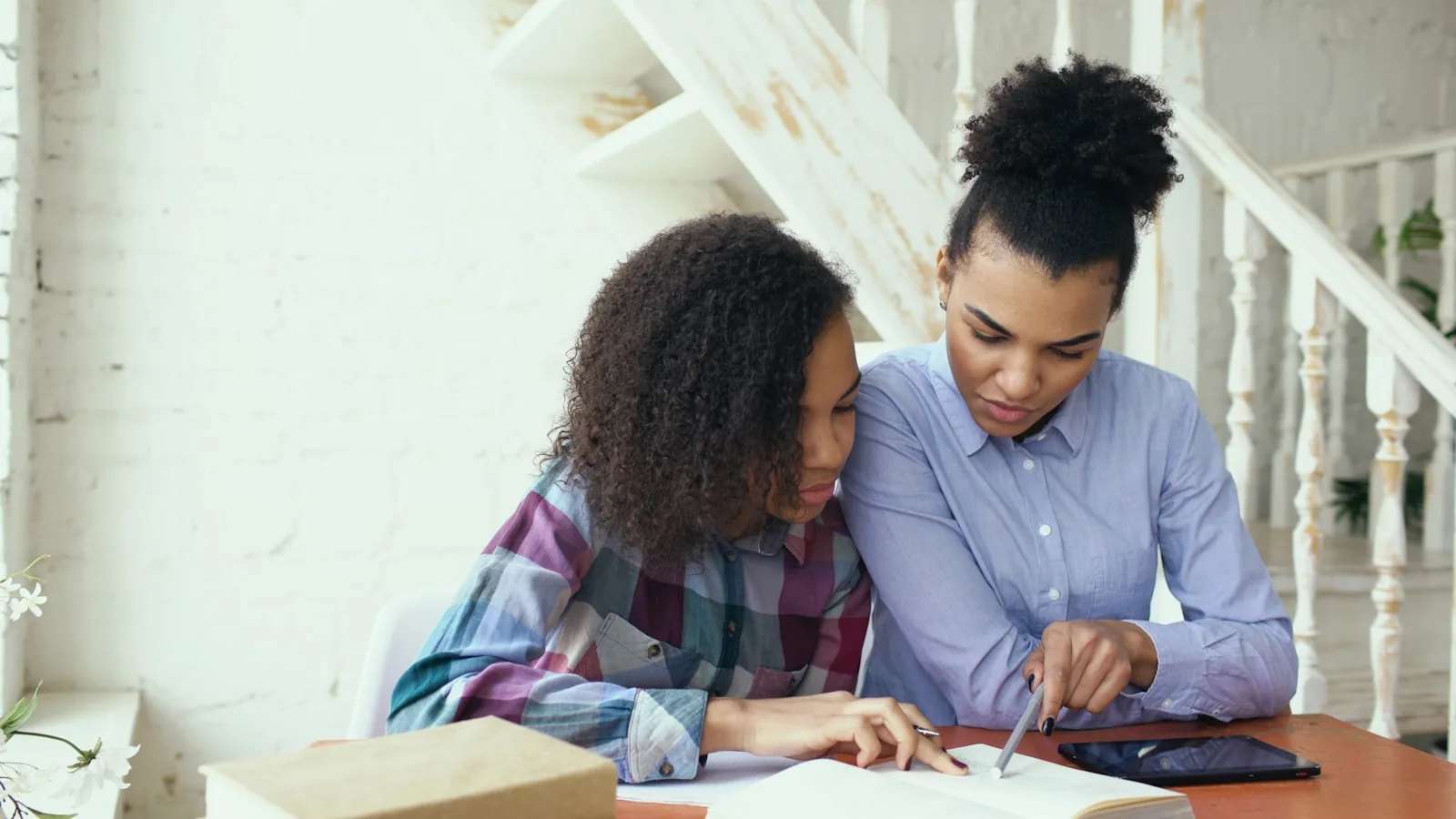 diverse couple planning budget finances