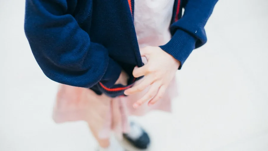 family buying school uniforms