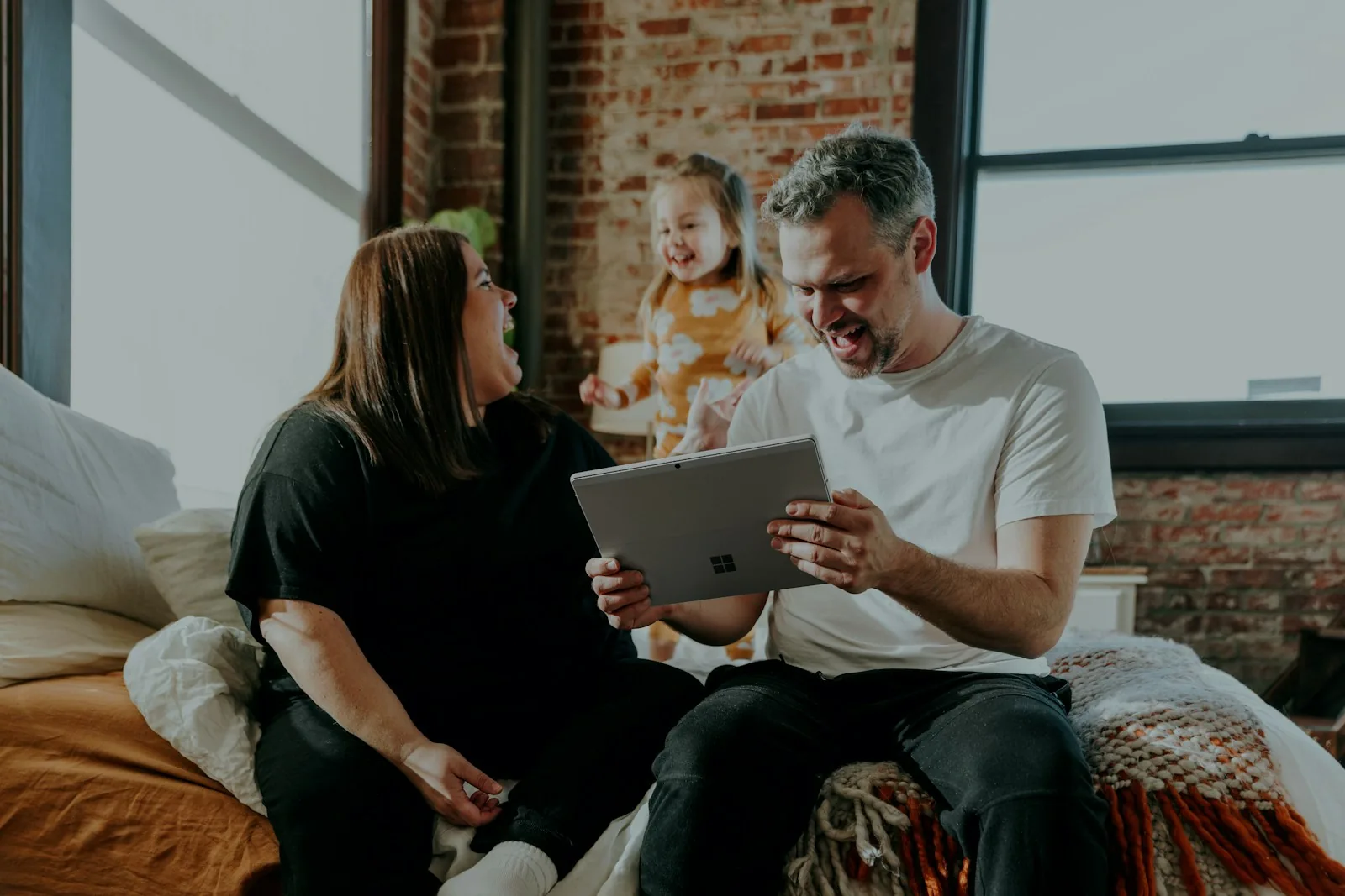 family reviewing investment portfolio documents