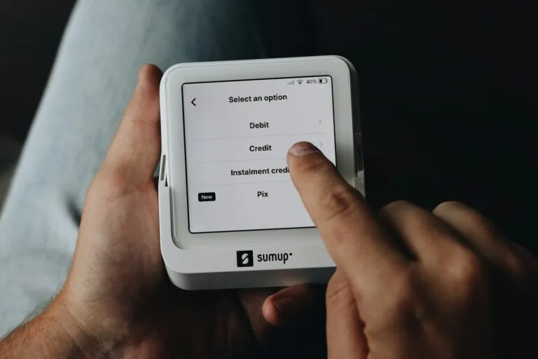 person reading on portable e-reader device