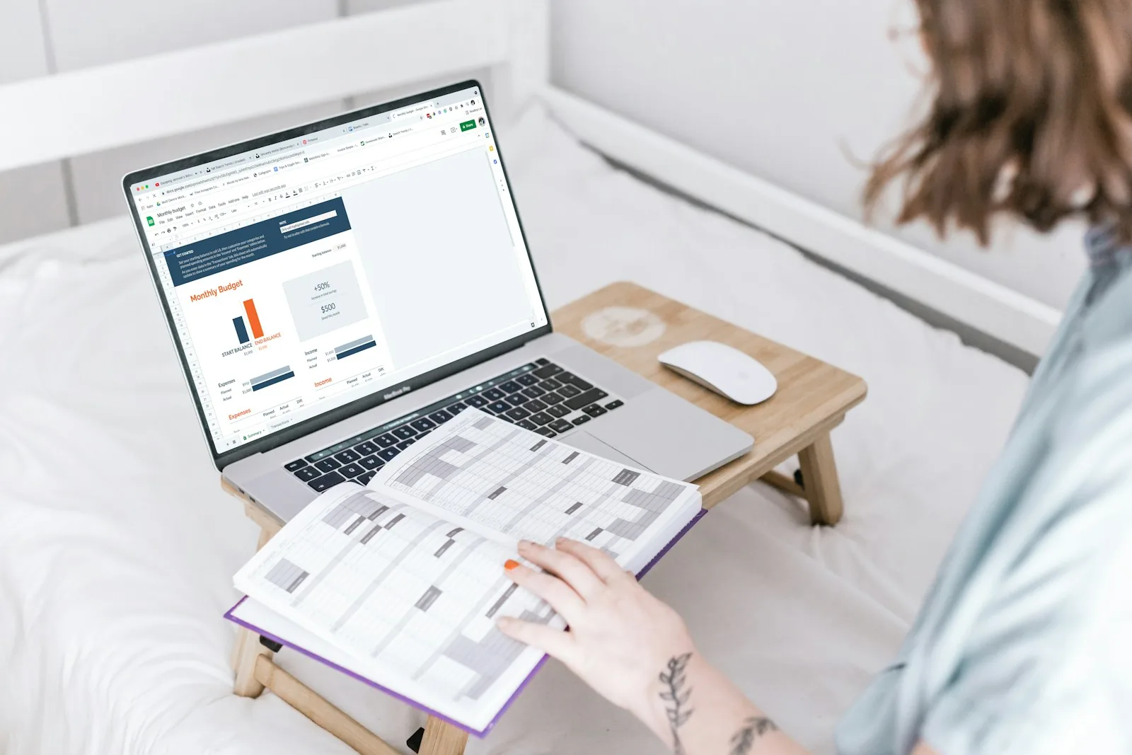 person reviewing budget spreadsheet planning