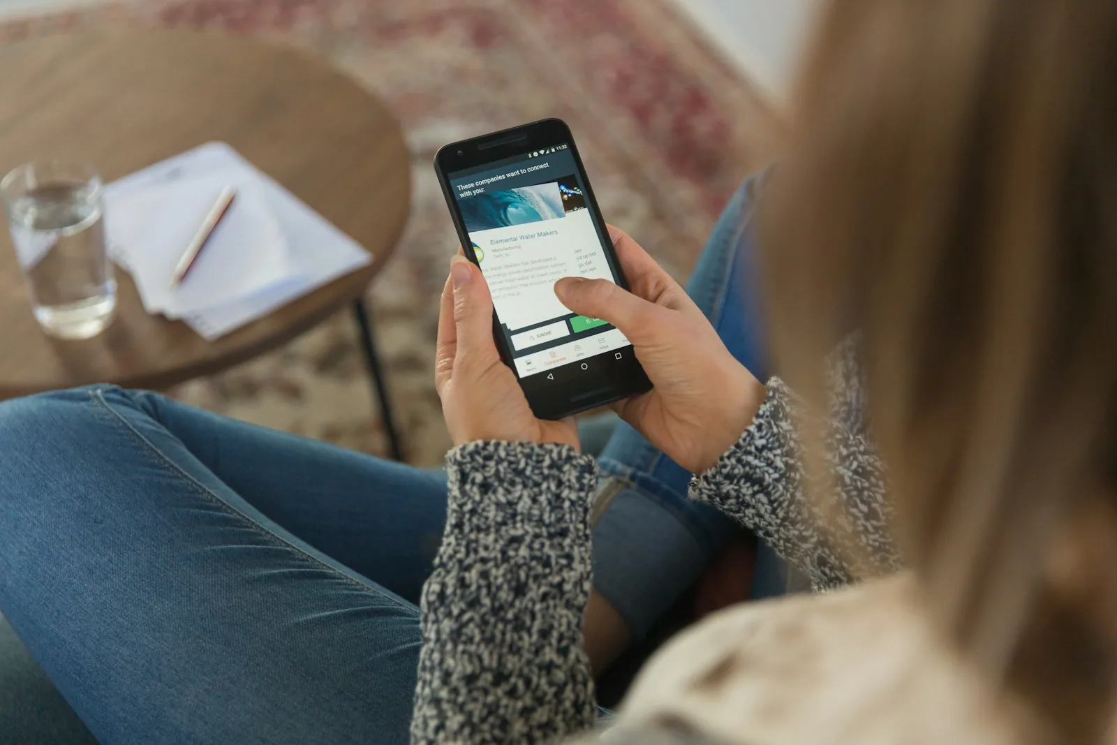 person using shopping app on phone