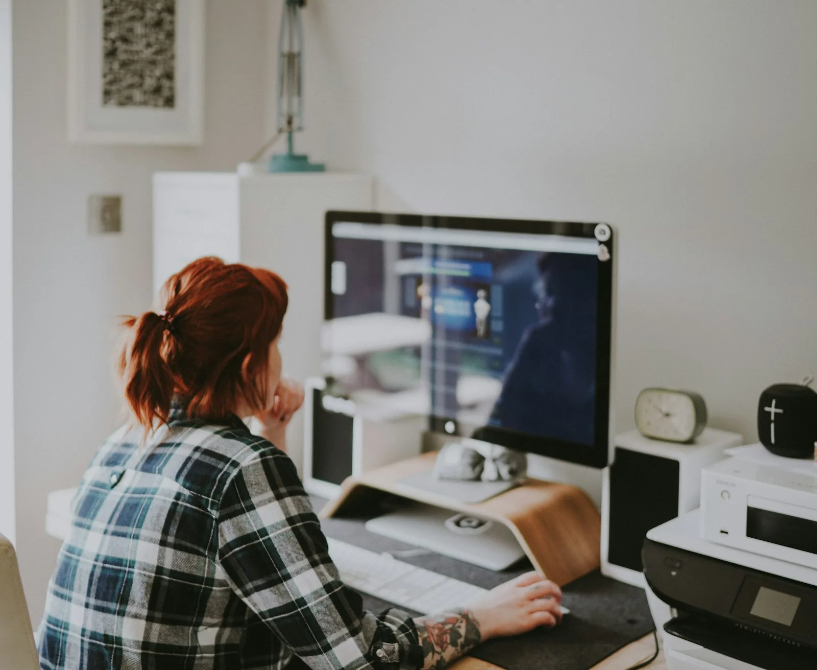 person working at modern computer setup