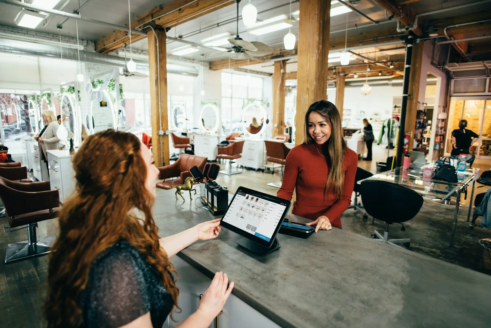 professional retail staff helping customer