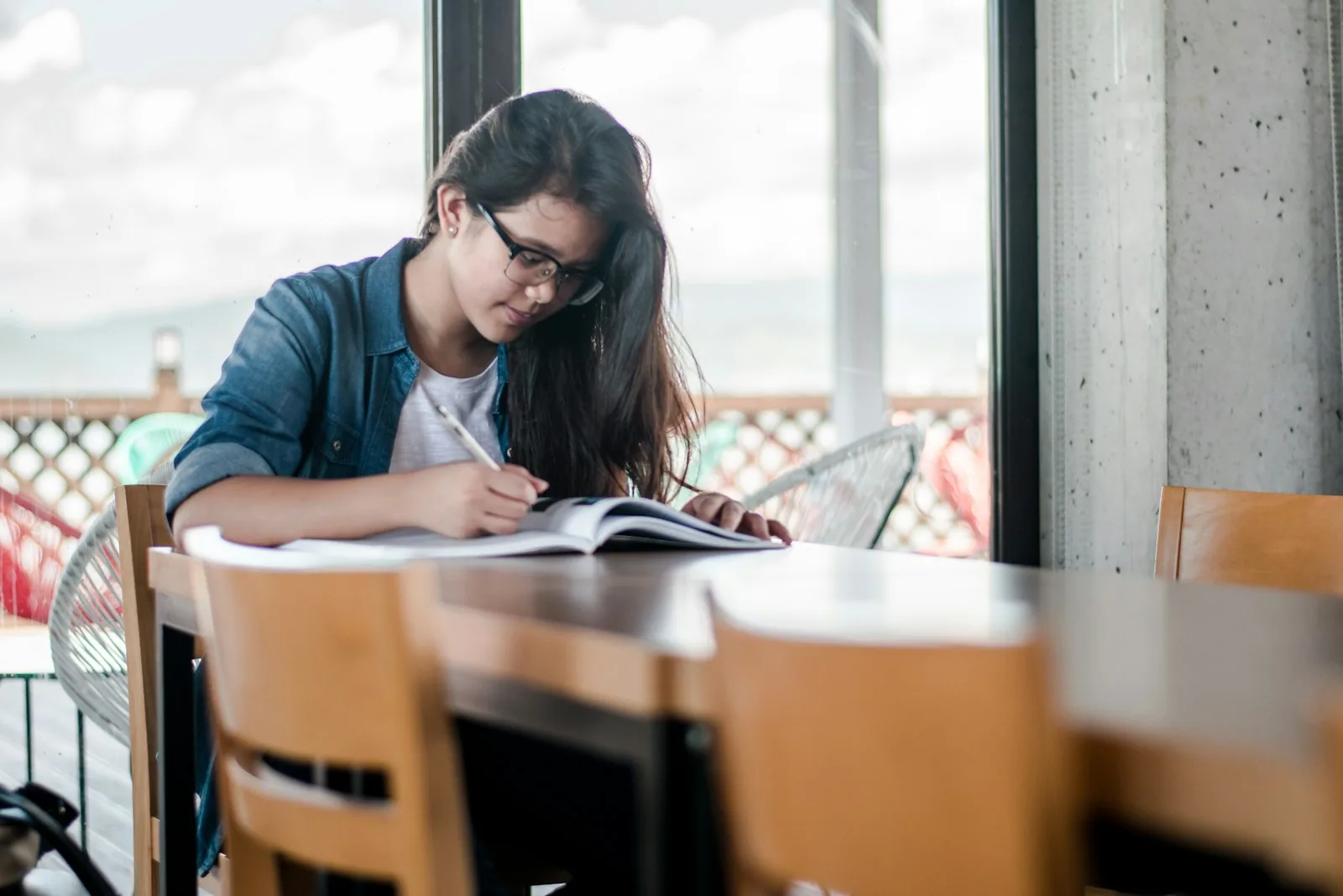 student studying with tablet device