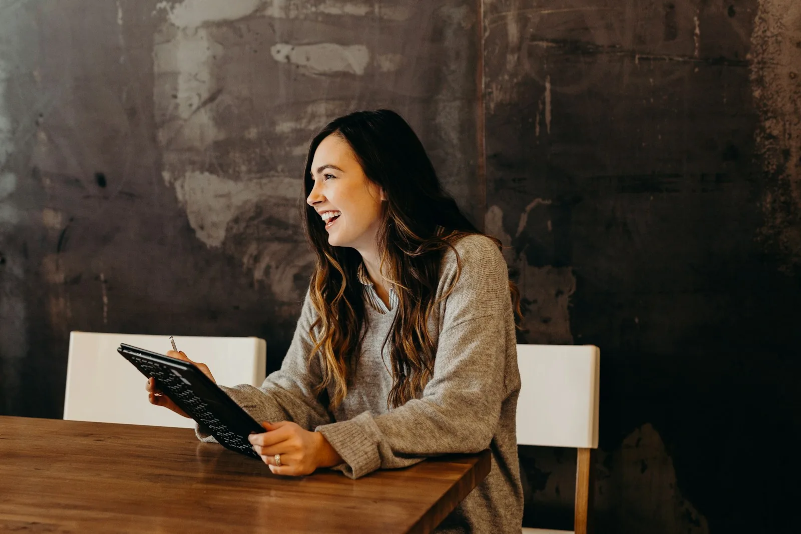 woman reviewing budget and bank statement