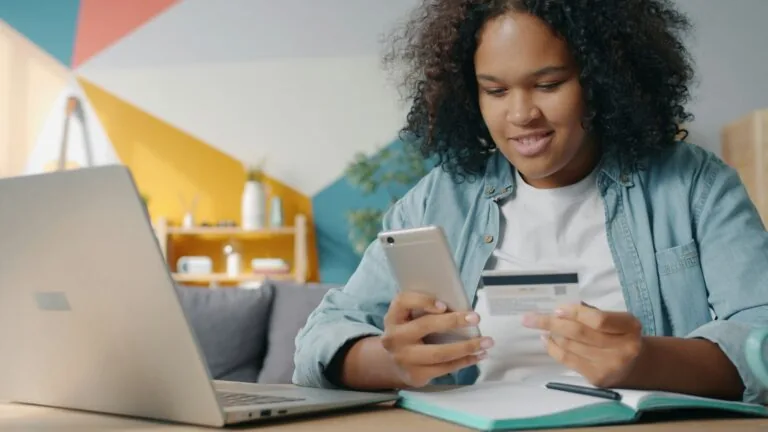 woman reviewing credit card bill budget