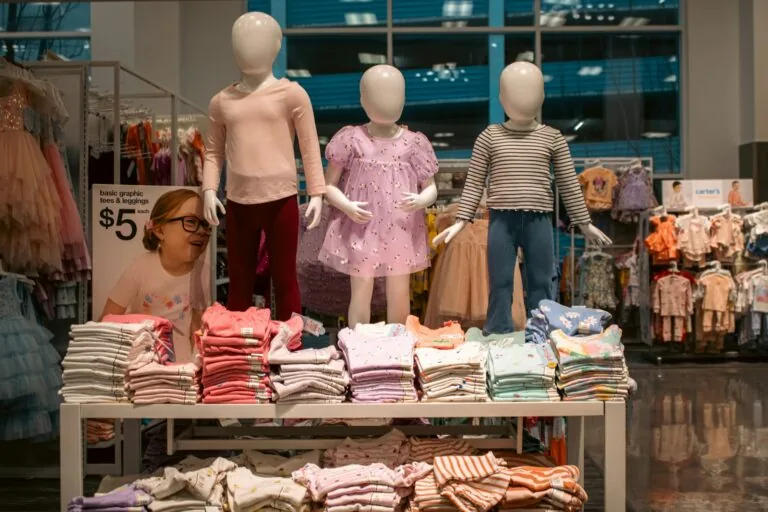 woman shopping department store clothing