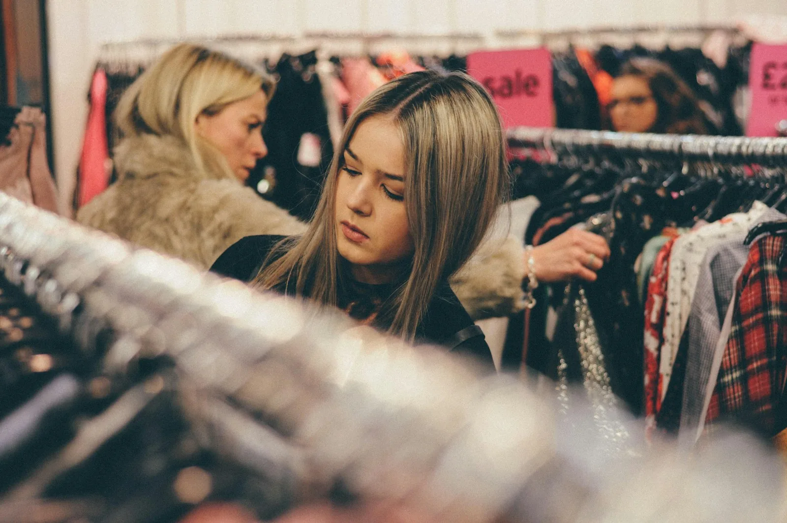 young shoppers checking prices
